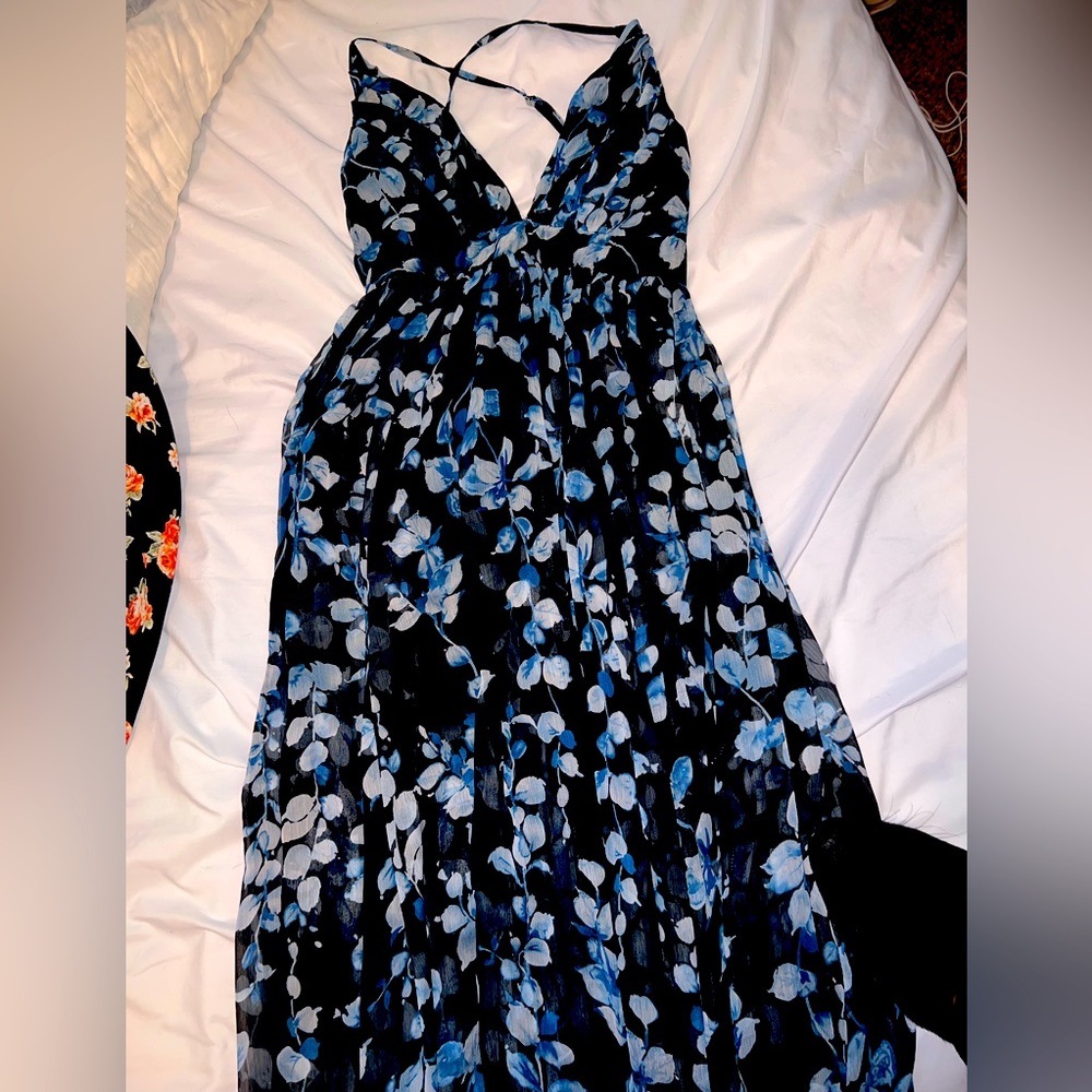 Long flowy maxi dress size small. Black with blue flowers